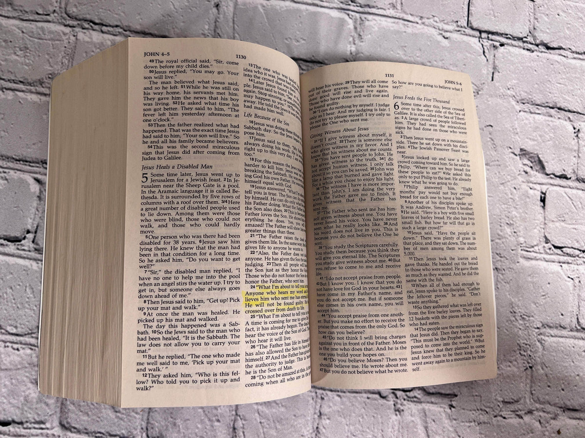 Pathlight: A Camper's Bible (NIrV), 2009 Biblica paperback - sample pages from John with yellow highlighting