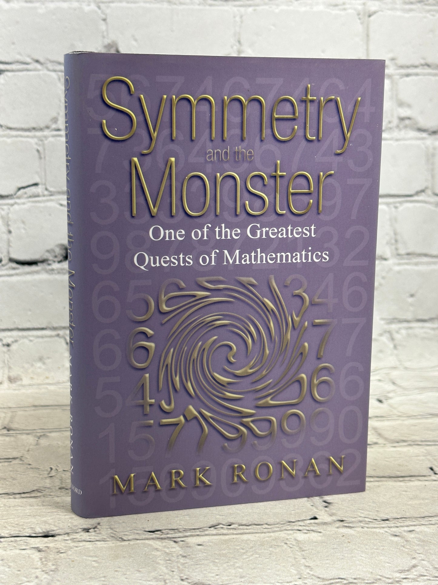 Symmetry and the Monster: One of the Greatest Quests..by Mark Ronan [2006]