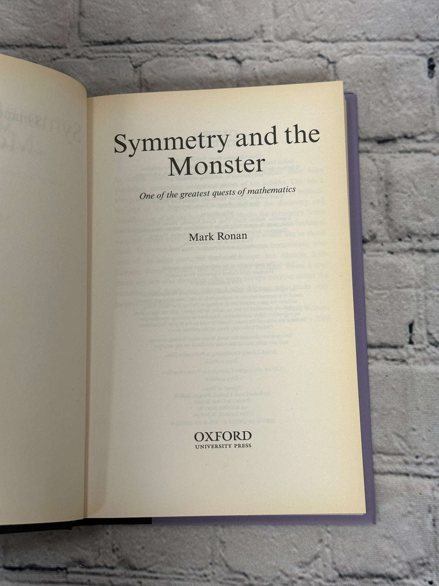 Symmetry and the Monster: One of the Greatest Quests..by Mark Ronan [2006]