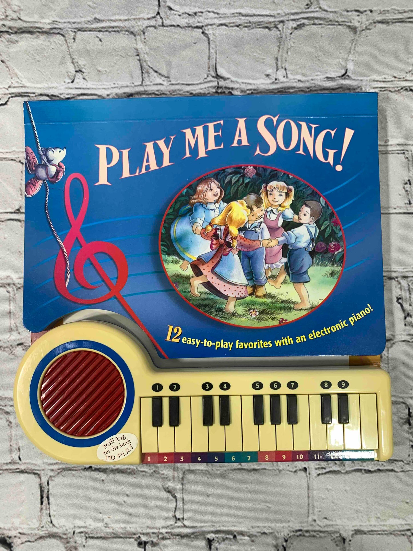 Play Me A Song: 12 Easy to play songs with an electric piano.