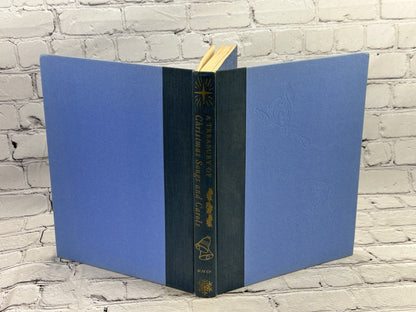 A Treasury of Christmas Songs and Carols by Henry W. Simon [1st Edition · 1955]