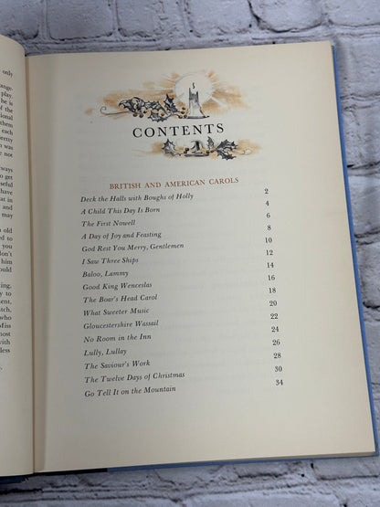 A Treasury of Christmas Songs and Carols by Henry W. Simon [1st Edition · 1955]