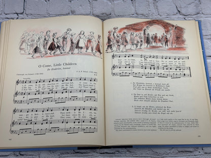 A Treasury of Christmas Songs and Carols by Henry W. Simon [1st Edition · 1955]