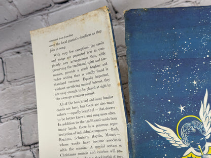 A Treasury of Christmas Songs and Carols by Henry W. Simon [1st Edition · 1955]