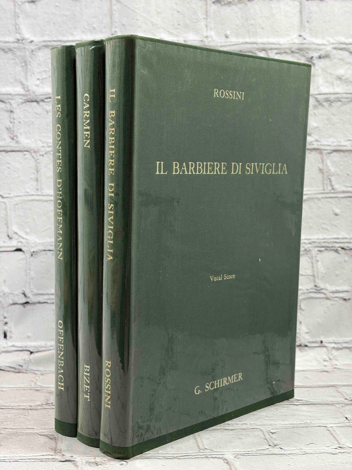 G. Schirmer Opera Vocal Scores Set of 3 by Rossini, Bizet and Offenbach, 1958-1962 hardcover - set standing with Il Barbiere di Siviglia front cover