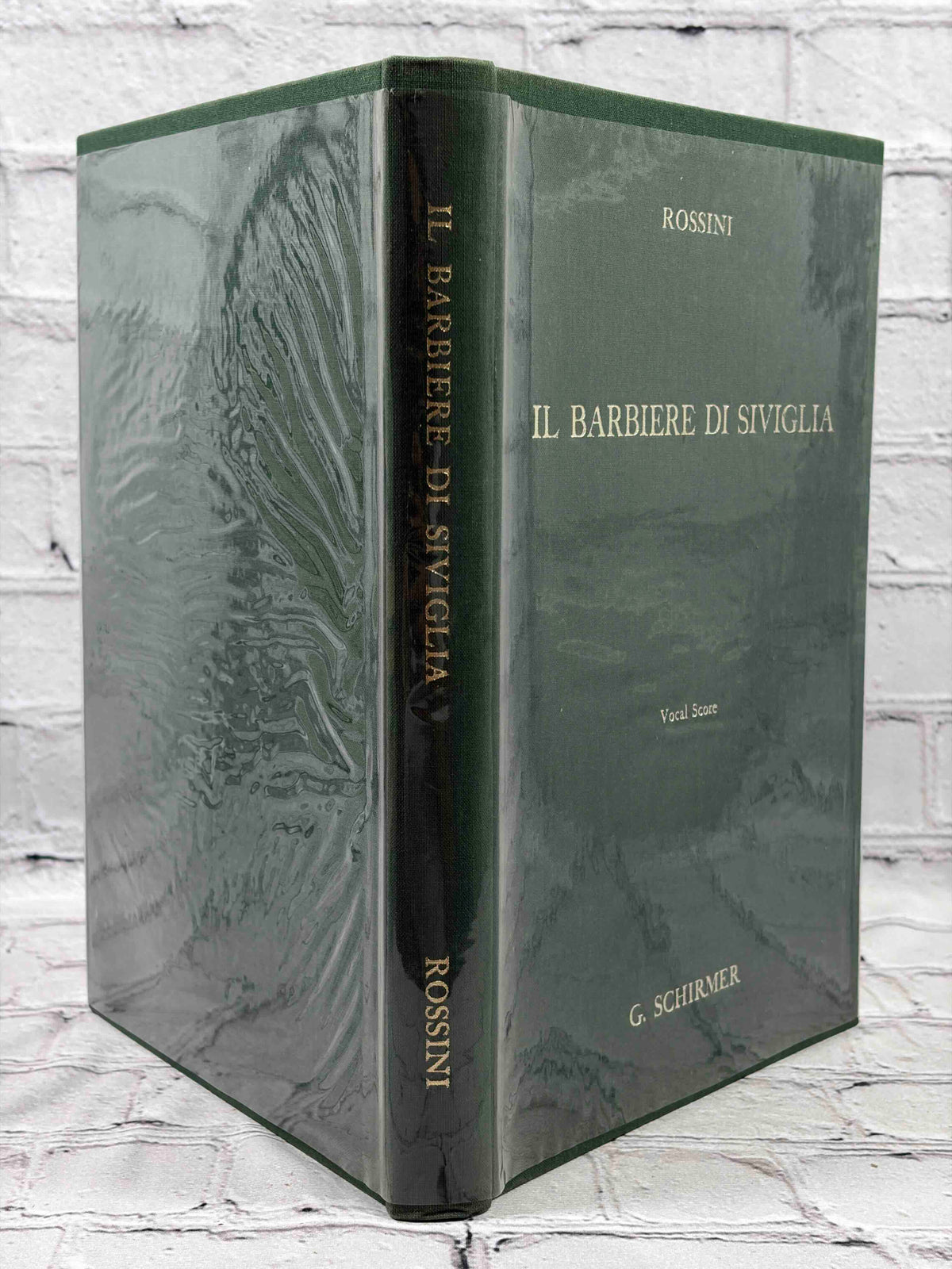 G. Schirmer Opera Vocal Scores Set of 3 by Rossini, Bizet and Offenbach, 1958-1962 hardcover - Il Barbiere di Siviglia covers and spine