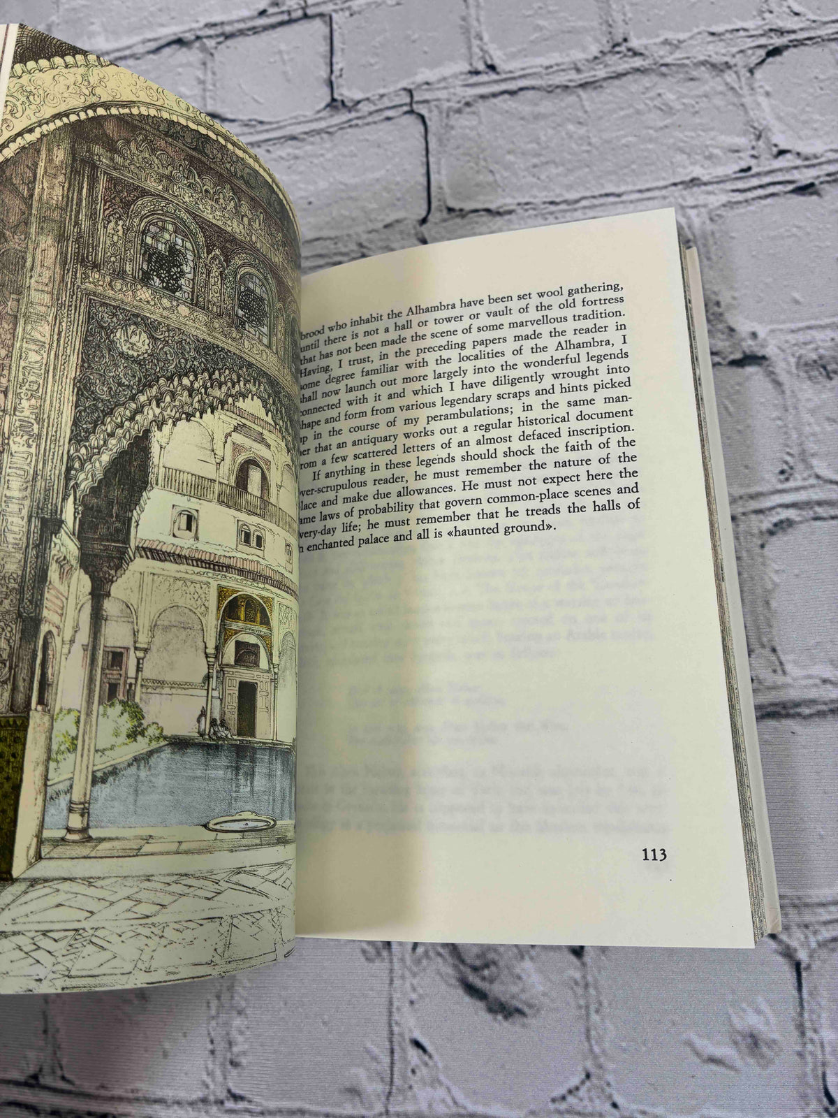 Tales of the Alhambra by Washington Irving, 1994 Ediciones Miguel Sanchez Paperback - illustration of an Alhambra courtyard and text page