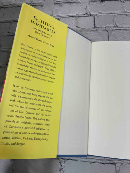 Fighting Windmills: Encounters with Don Quixote by Manuel Duran and Fay R. Rogg, 2006 Yale University Press Hardcover - front jacket flap and front free endpaper
