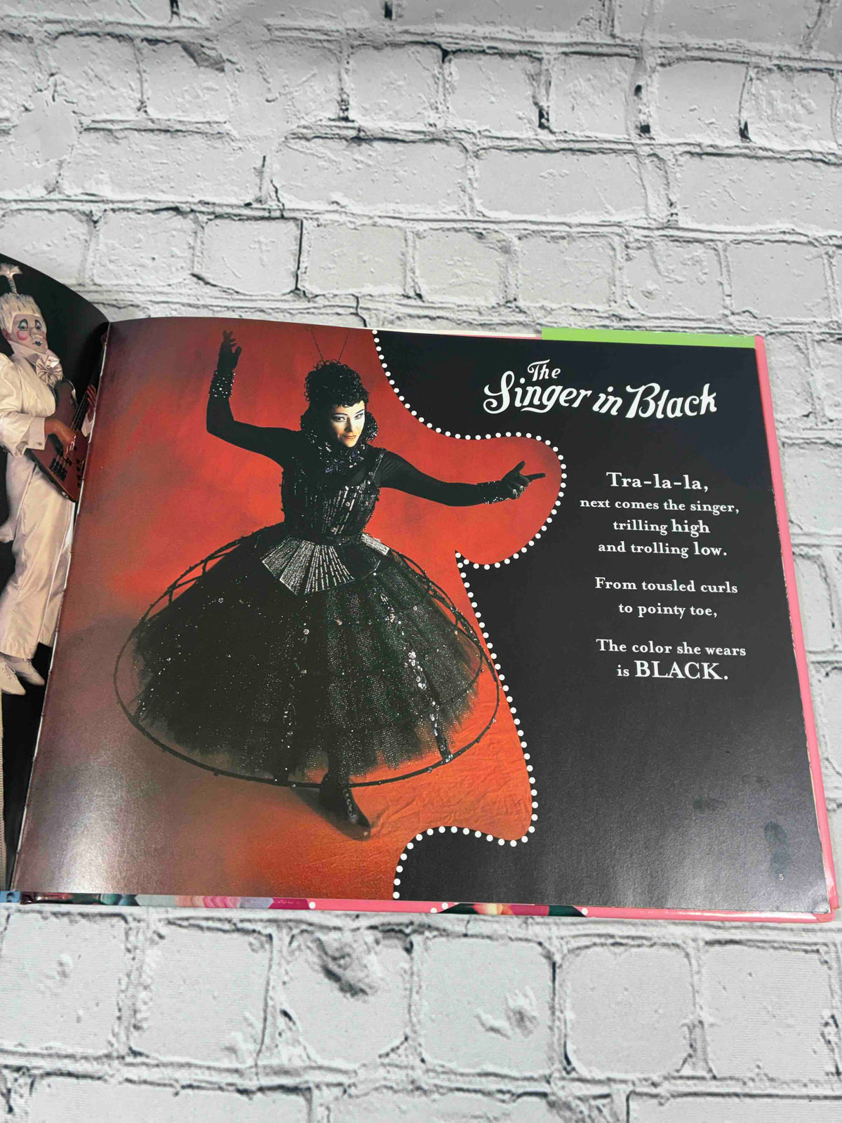 Cirque du Soleil Parade of Colors by Patrisha Robertson, 2003 Abrams hardcover - interior page The Singer in Black