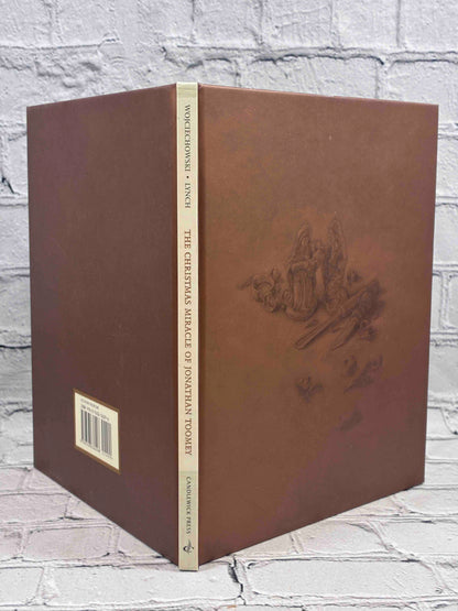 The Christmas Miracle of Jonathan Toomey by Susan Wojciechowski, hardcover with CD - brown boards and spine