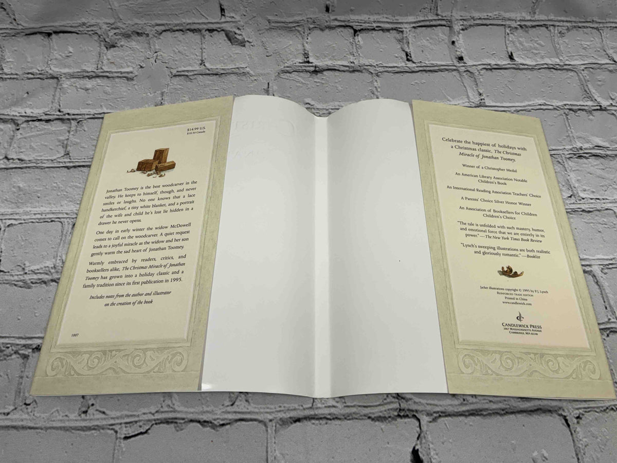 The Christmas Miracle of Jonathan Toomey by Susan Wojciechowski, hardcover with CD - inside of dust jacket with flaps