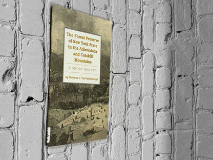 The Forest Preserve of New York State in the Adirondack and Catskill Mountains by Norman J. VanValkenburgh, 1996 Purple Mountain Press paperback - front cover at an angle showing library spine label