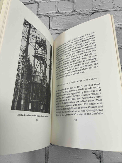 The Forest Preserve of New York State in the Adirondack and Catskill Mountains by Norman J. VanValkenburgh, 1996 Purple Mountain Press paperback - early fire tower on Hunter Mountain and sample text