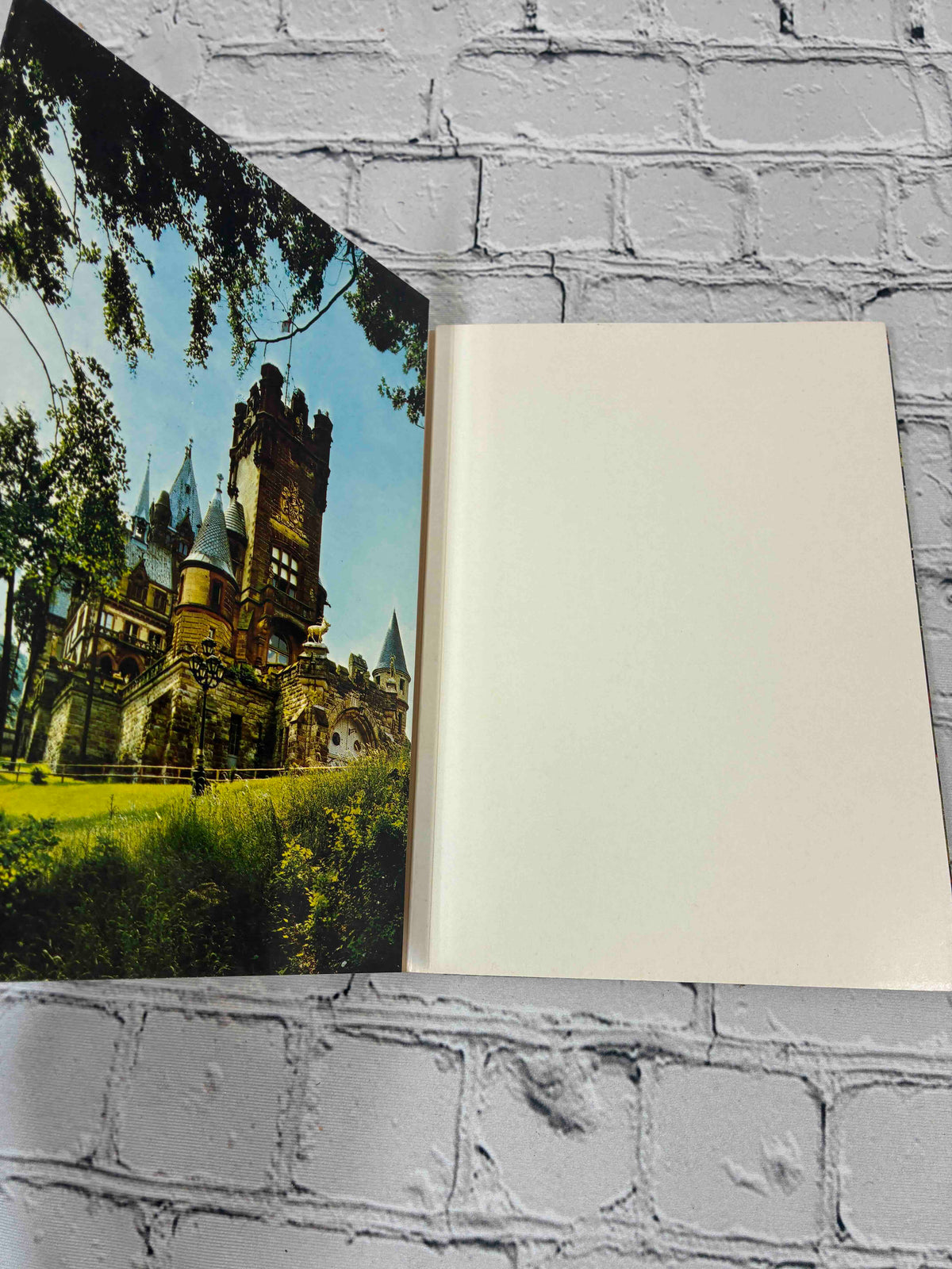 Castles on the Rhine between Mainz and Cologne by Eugen Hollerbach, Rahmel-Verlag paperback - inside front cover photo of Schloss Drachenburg
