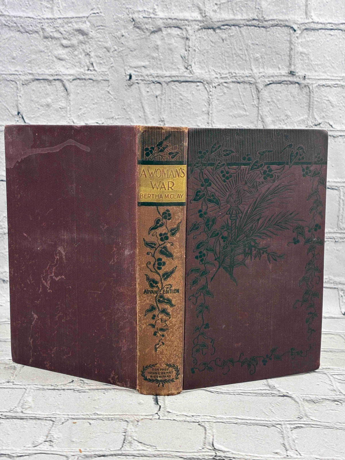 A Woman's War by Bertha M. Clay, Donohue Henneberry hardcover - spine and boards