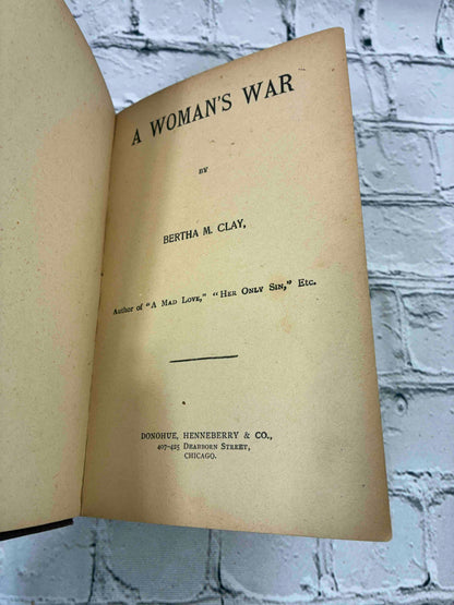 A Woman's War by Bertha M. Clay, Donohue Henneberry hardcover - title page