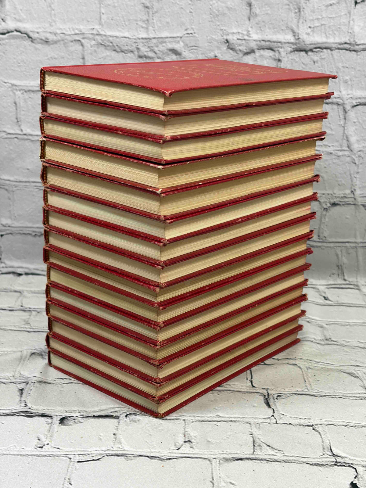 A Guide Book of United States Coins (Red Book) lot of 15 by R. S. Yeoman, 1961-1982 - page edges of the stack