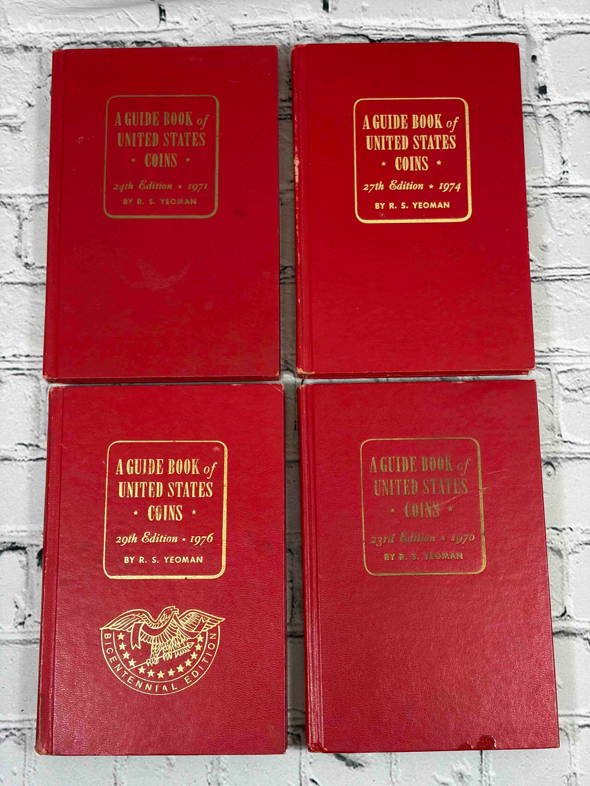 A Guide Book of United States Coins (Red Book) lot of 15 by R. S. Yeoman, 1961-1982 - front covers incl. 1971, 1974 and 1976 Bicentennial editions