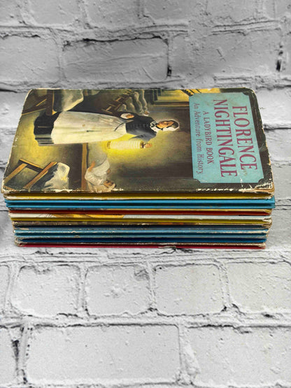 Lot of 8 vintage Ladybird books - stack side view