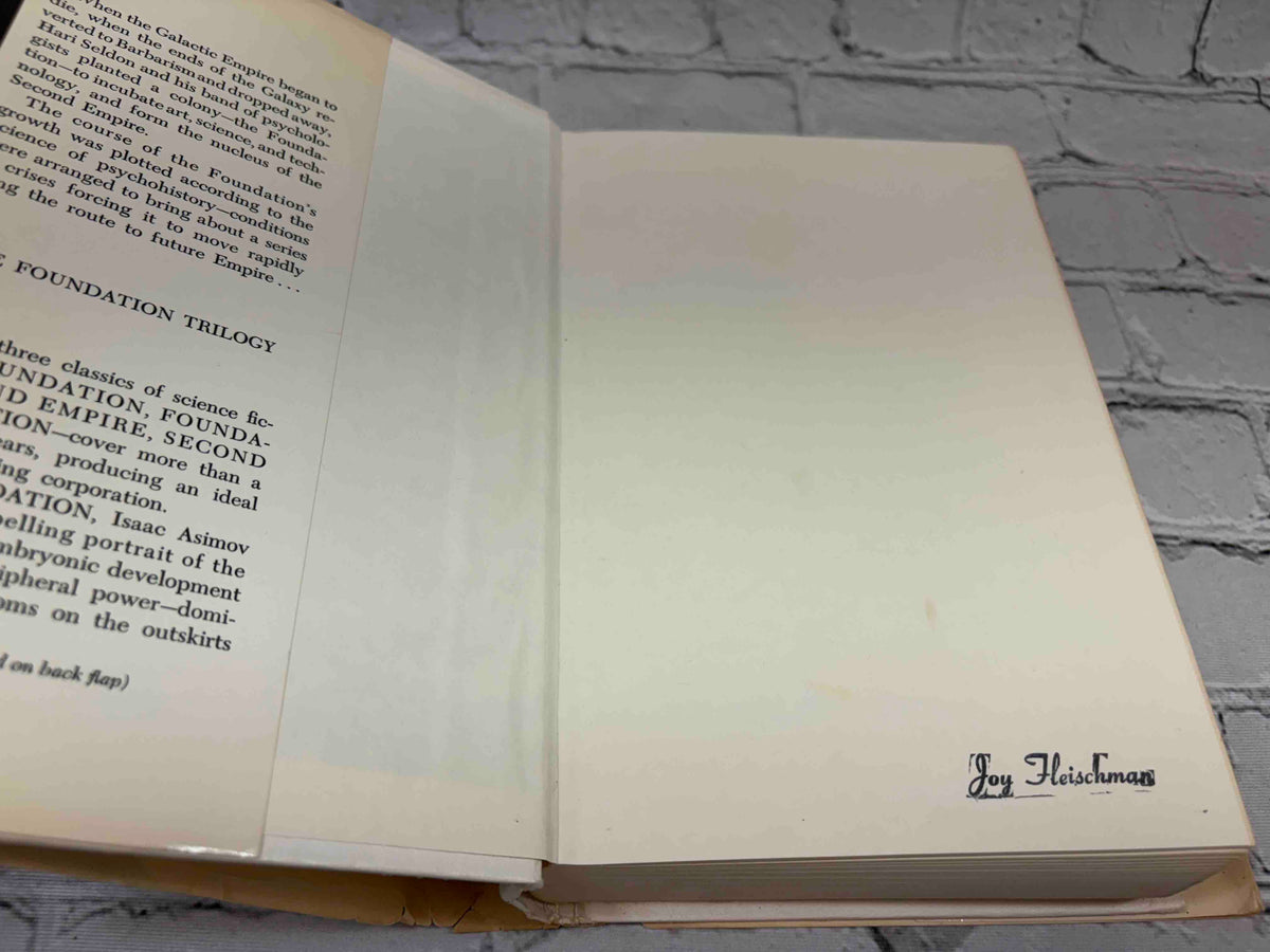The Foundation Trilogy by Isaac Asimov, Doubleday book club hardcover - front endpaper with owner name