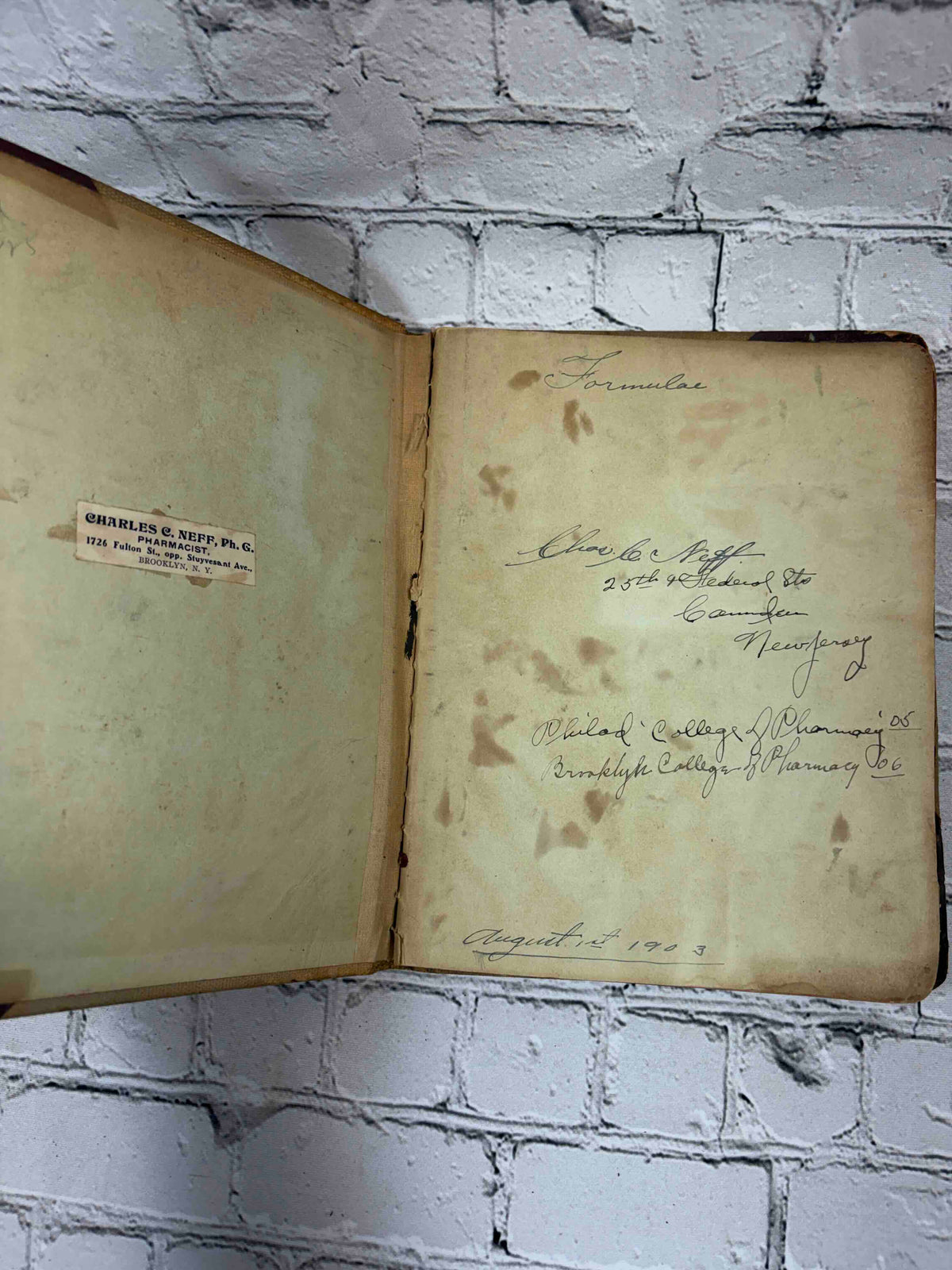 Pharmacist's handwritten formula book of Charles C. Neff, Ph.G., 1903-1906 - first page with Neff's signature and Formulae title