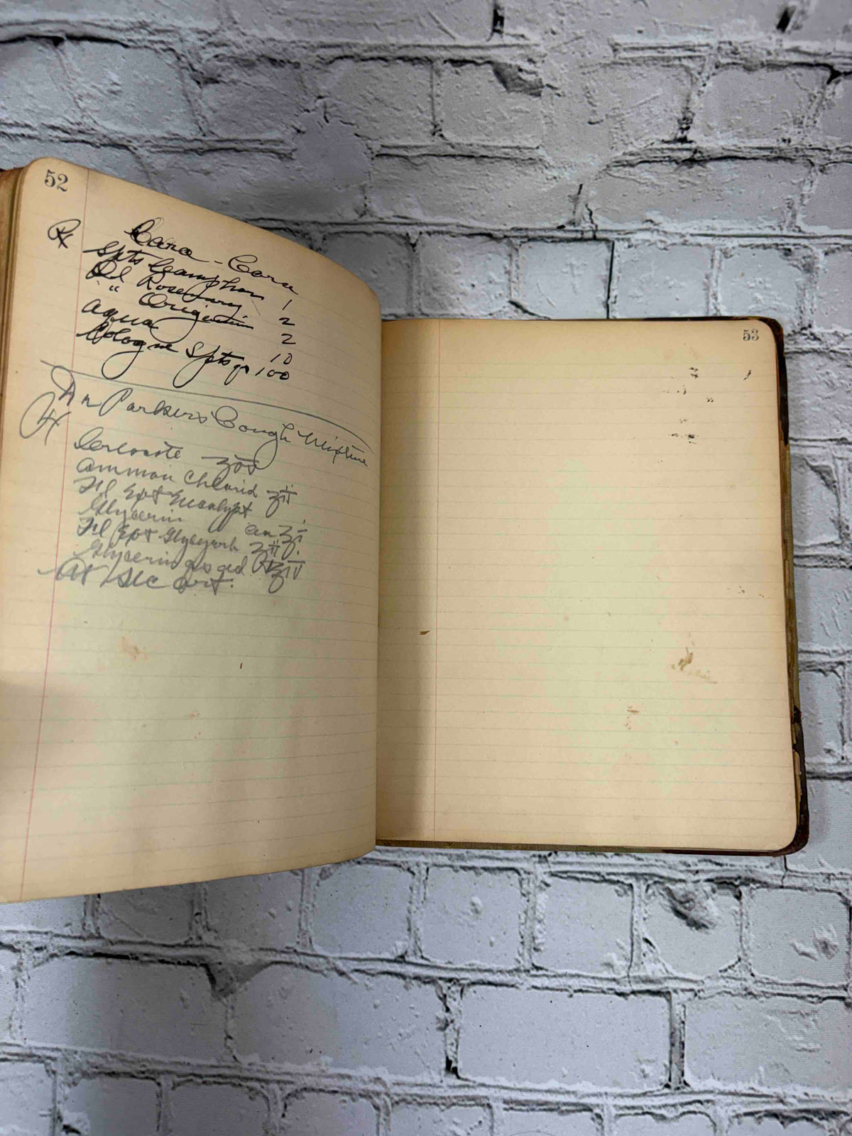 Pharmacist's handwritten formula book of Charles C. Neff, Ph.G., 1903-1906 - handwritten formulas and blank page, pages 52-53