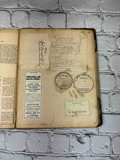 Pharmacist's handwritten formula book of Charles C. Neff, Ph.G., 1903-1906 - pasted-in labels and notes, page 99