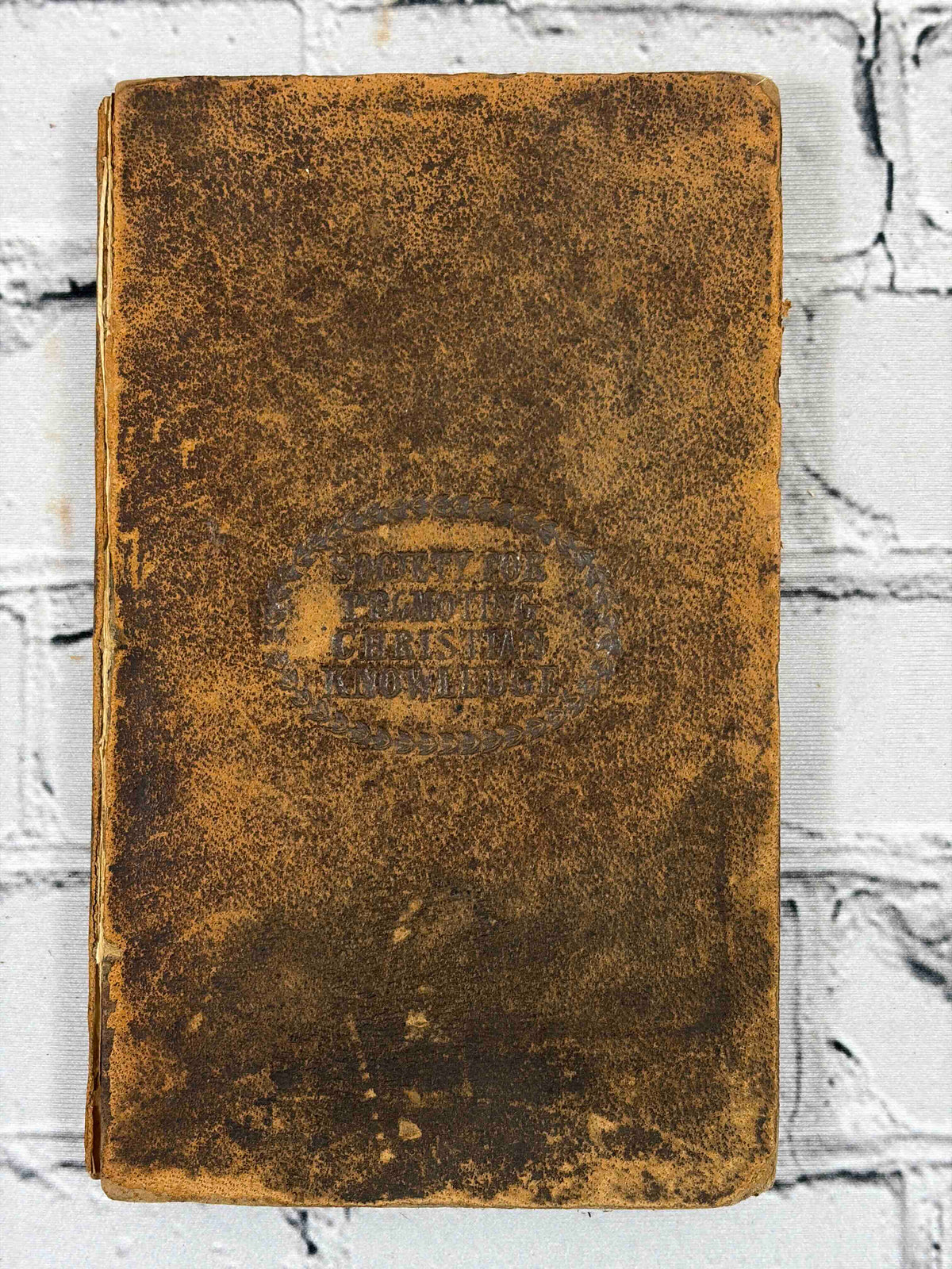 An Abridgment of the New Testament by Mrs. Trimmer, Rivington leather edition - front cover with SPCK stamp