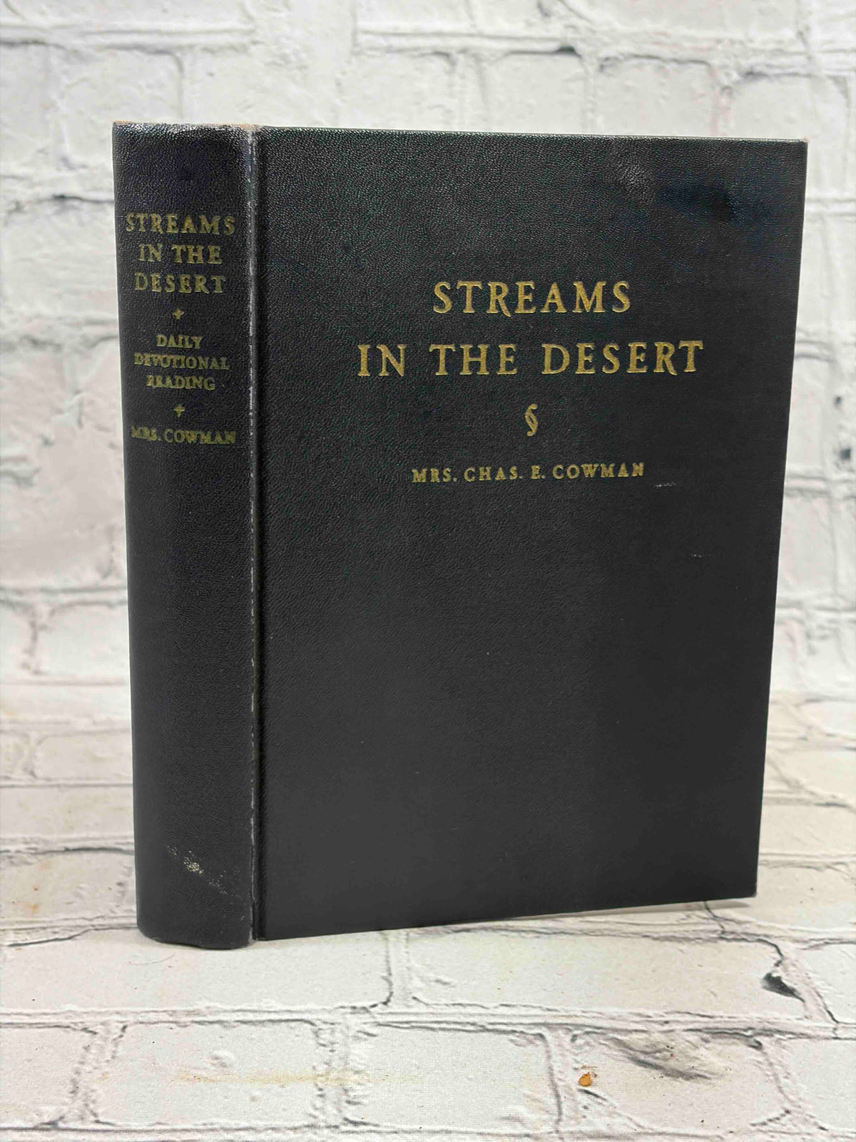Streams in the Desert by Mrs. Chas. E. Cowman, 22nd edition - front cover and spine