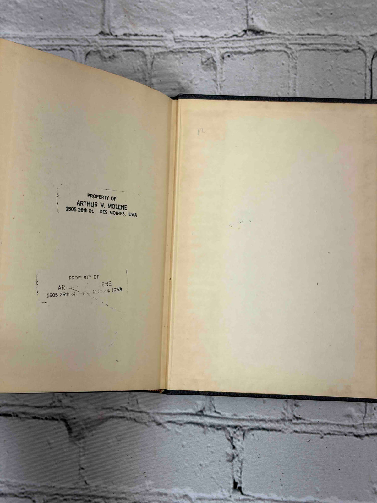Streams in the Desert by Mrs. Chas. E. Cowman, 22nd edition - owner stamps on rear pastedown