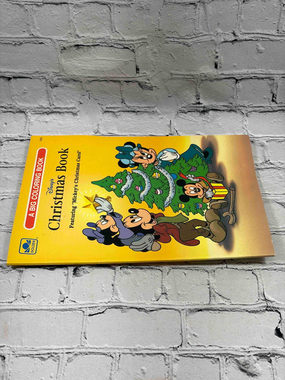 Disney's Christmas Book Featuring Mickey's Christmas Carol, 1989 Golden coloring book - front cover at an angle