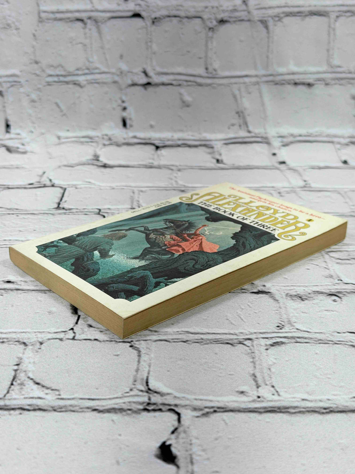 The Book of Three by Lloyd Alexander, 1980 Dell Laurel-Leaf paperback - cover and page edges
