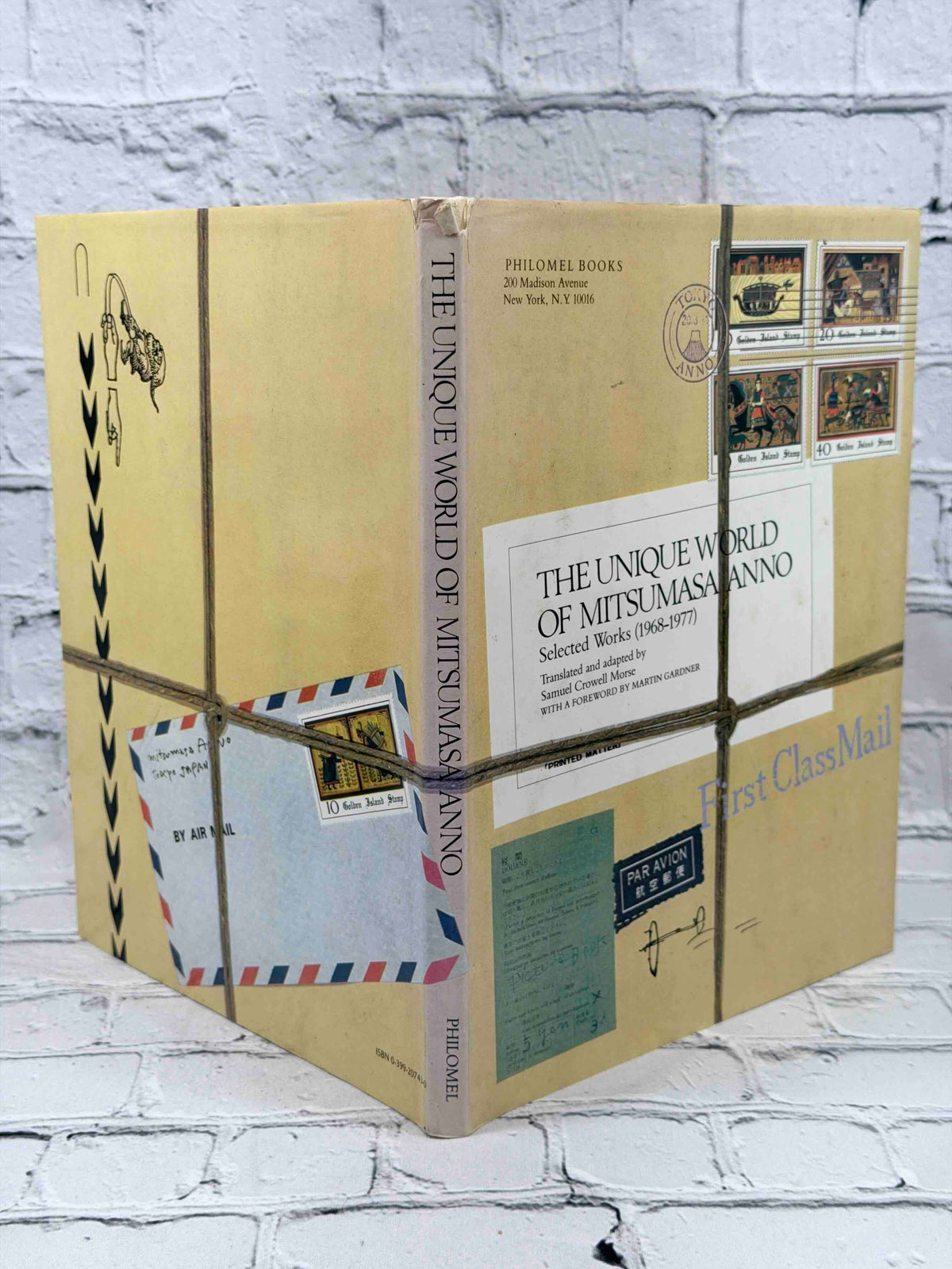 The Unique World of Mitsumasa Anno by Mitsumasa Anno, 1980 Philomel Books Hardcover - dust jacket spine and back panel