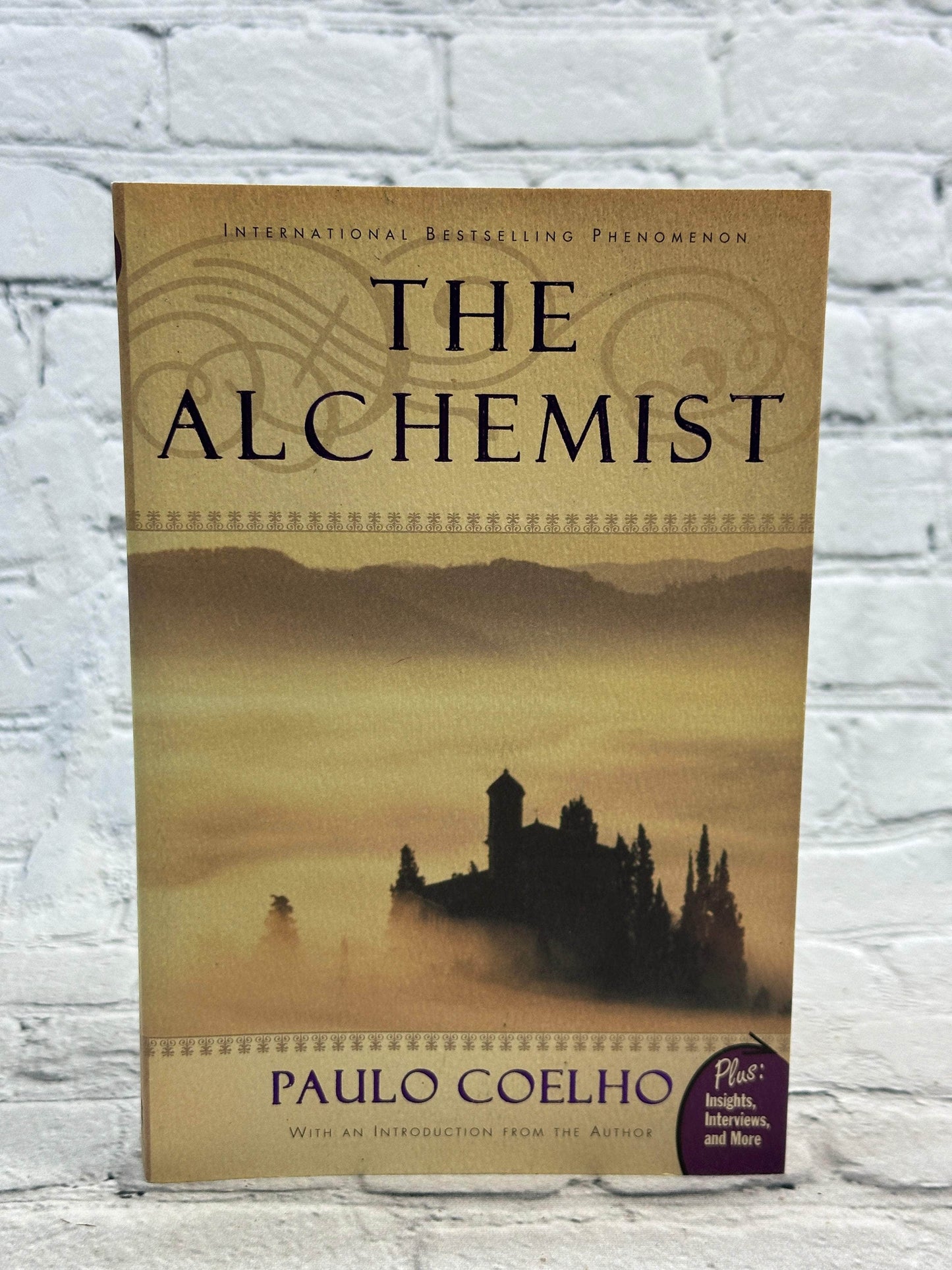 Flipped Pages The Alchemist by Paulo Coelho [1998 · Sixth Printing]