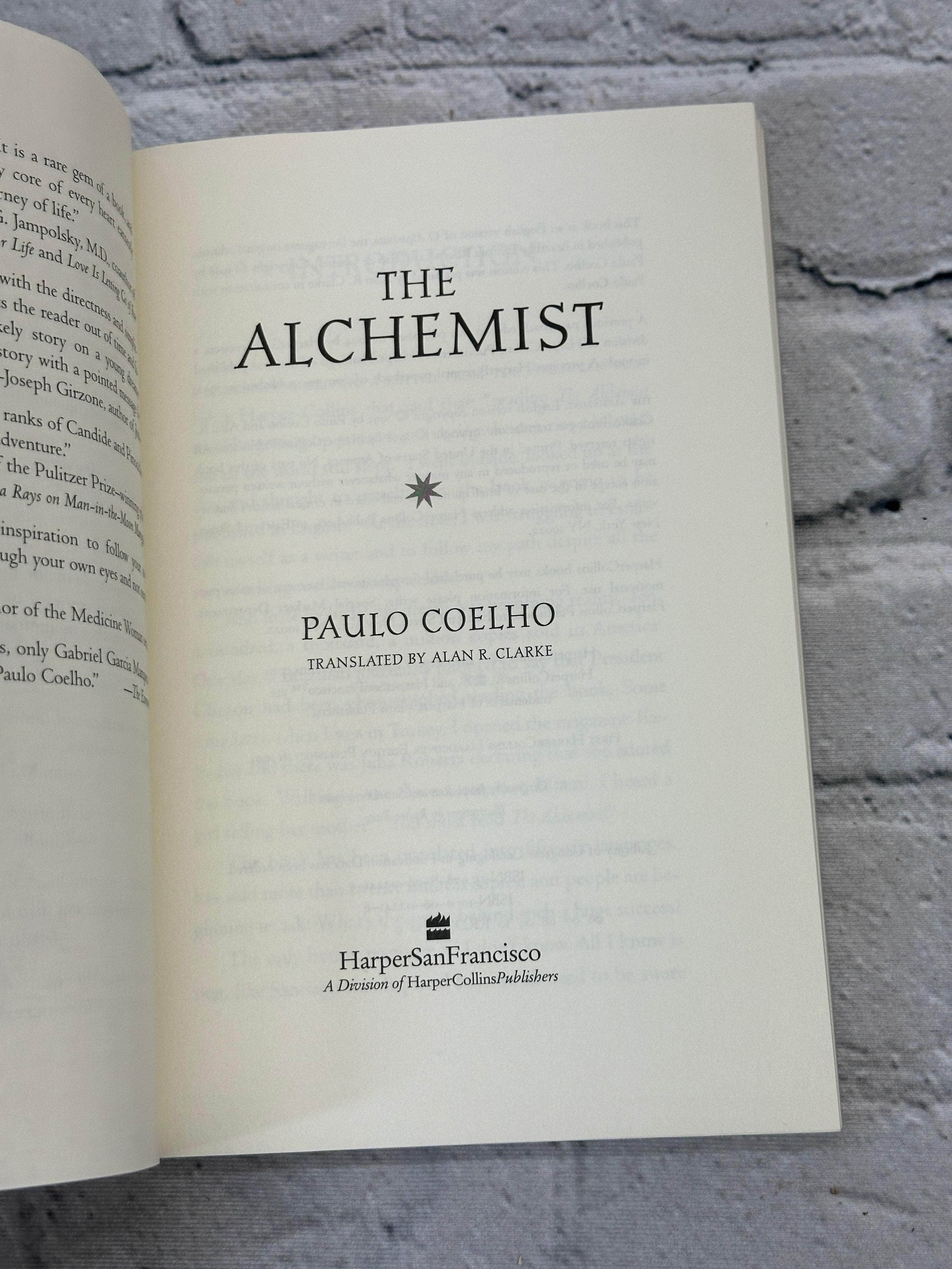 Flipped Pages The Alchemist by Paulo Coelho [1998 · Sixth Printing]