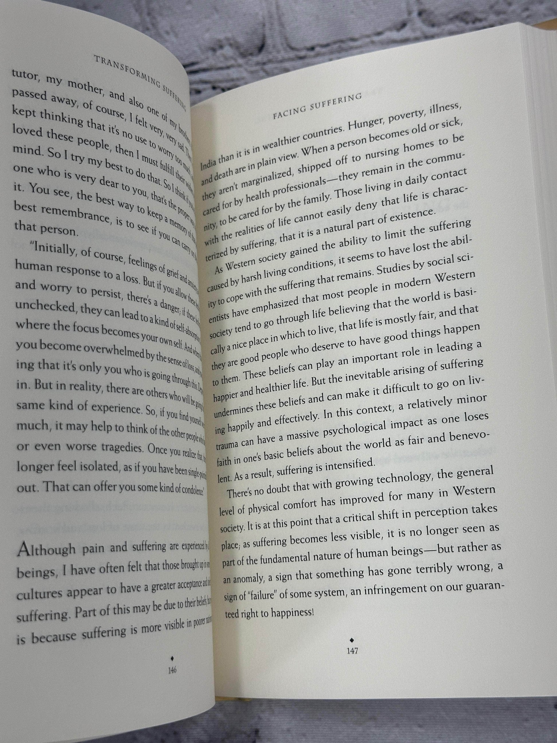 Flipped Pages The Art of Happiness A Handbook for Living by The Dalai Lamar [1998]