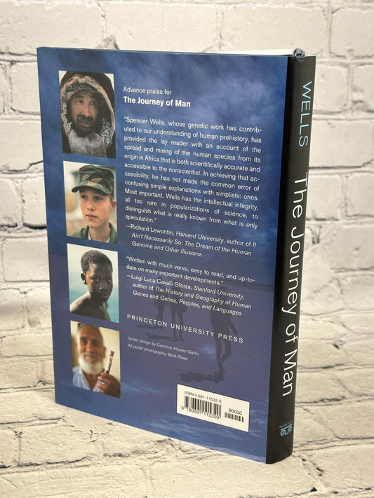 Flipped Pages The Journey of Man: A Genetic Odyssey by Spencer Wells [2002 · Signed]