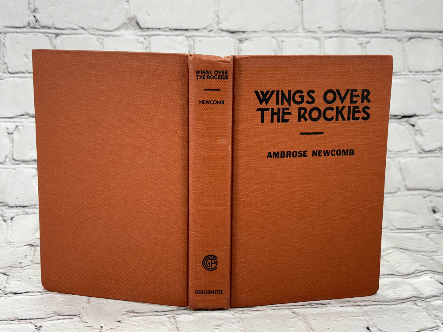 Flipped Pages Wings Over the Rockies  by Ambrose Newcomb [1930]