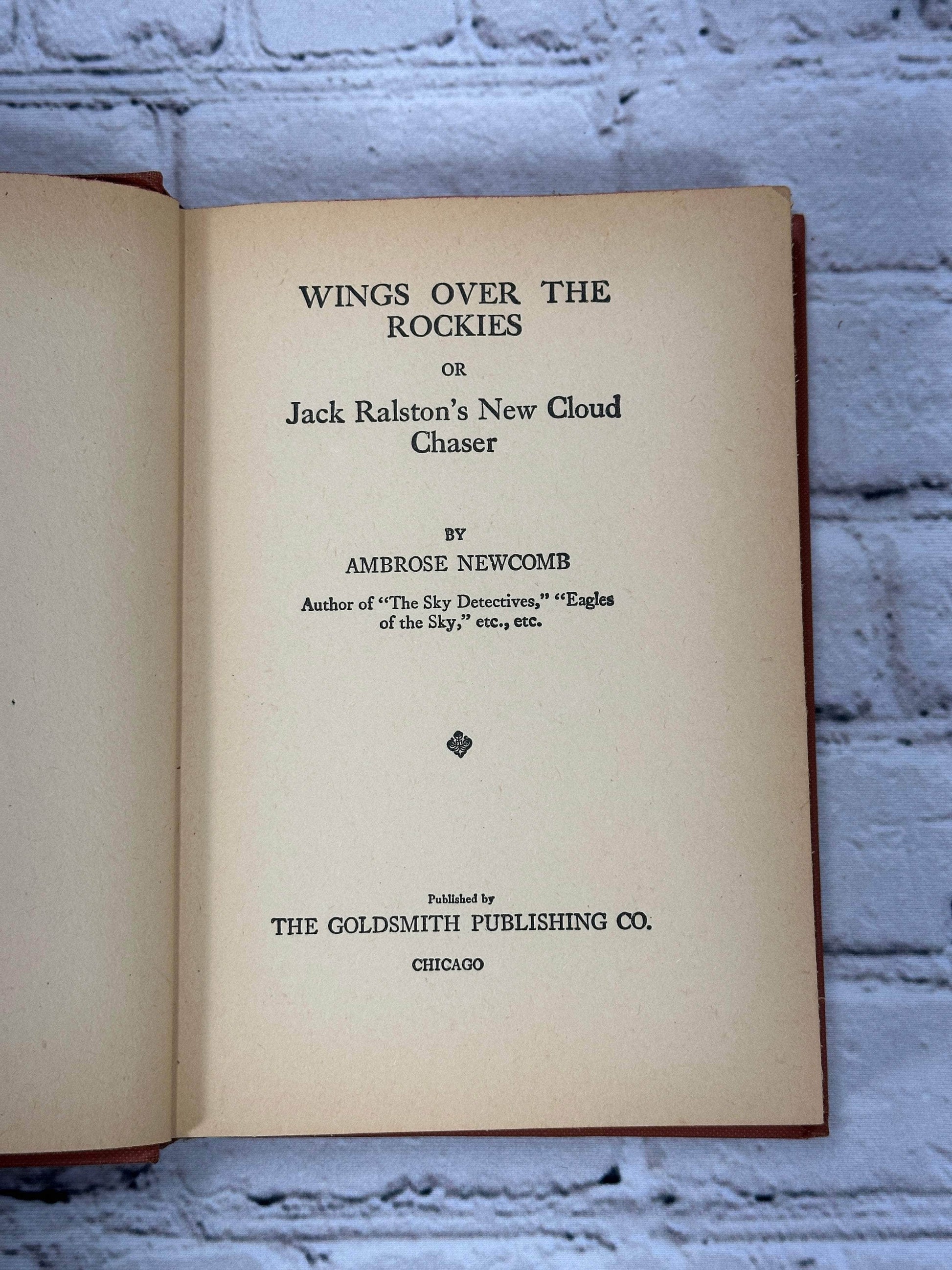 Flipped Pages Wings Over the Rockies  by Ambrose Newcomb [1930]