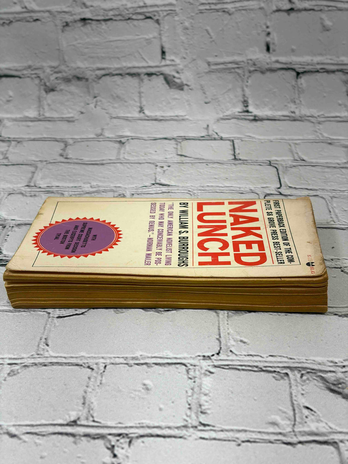 Naked Lunch by William S. Burroughs, 1966 Grove Press paperback - front cover and top edge
