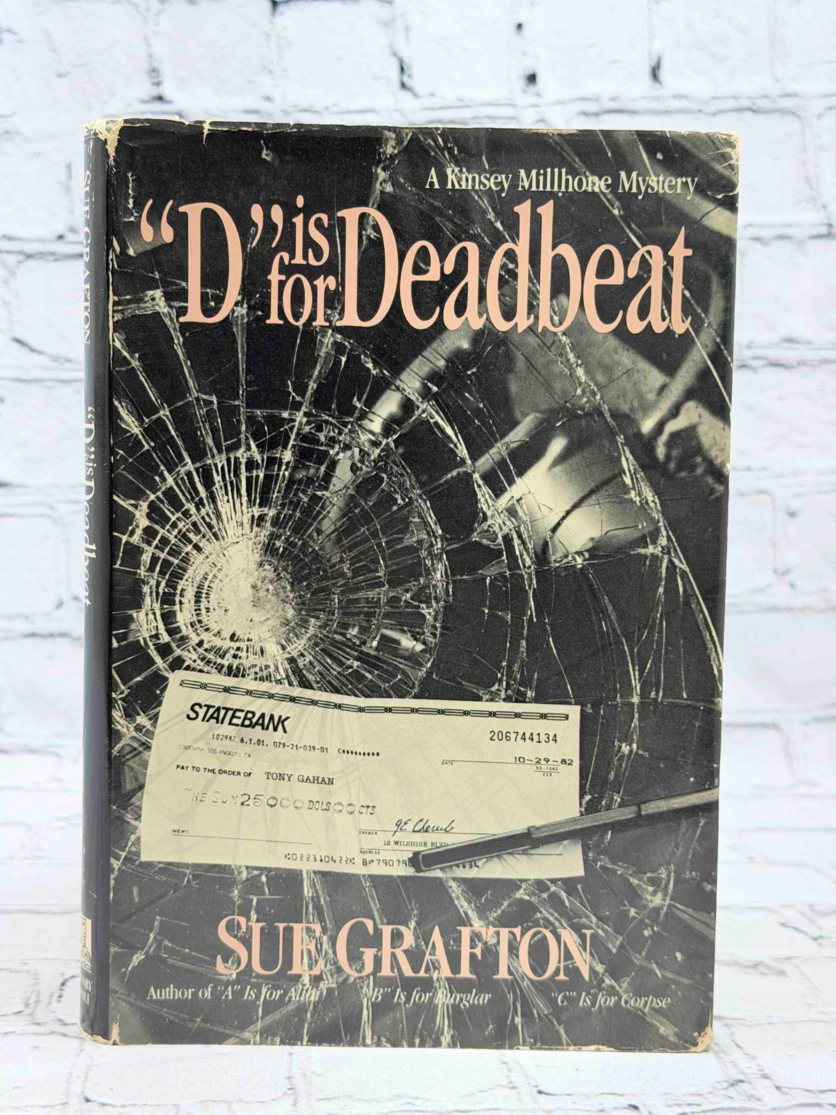 D Is for Deadbeat by Sue Grafton, 1987 Henry Holt hardcover - dust jacket front