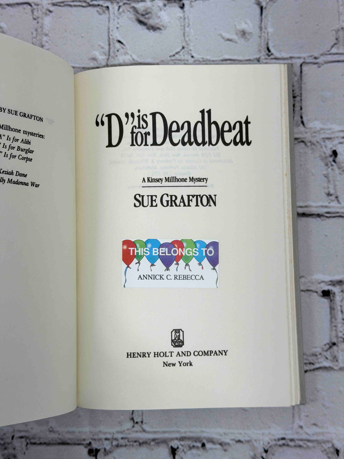 D Is for Deadbeat by Sue Grafton, 1987 Henry Holt hardcover - title page with owner sticker