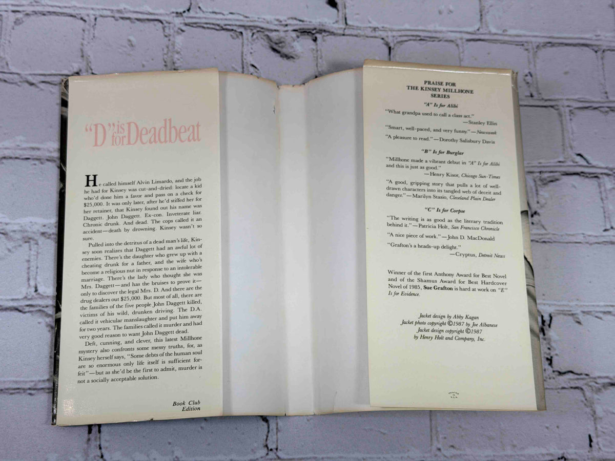 D Is for Deadbeat by Sue Grafton, 1987 Henry Holt hardcover - dust jacket flaps