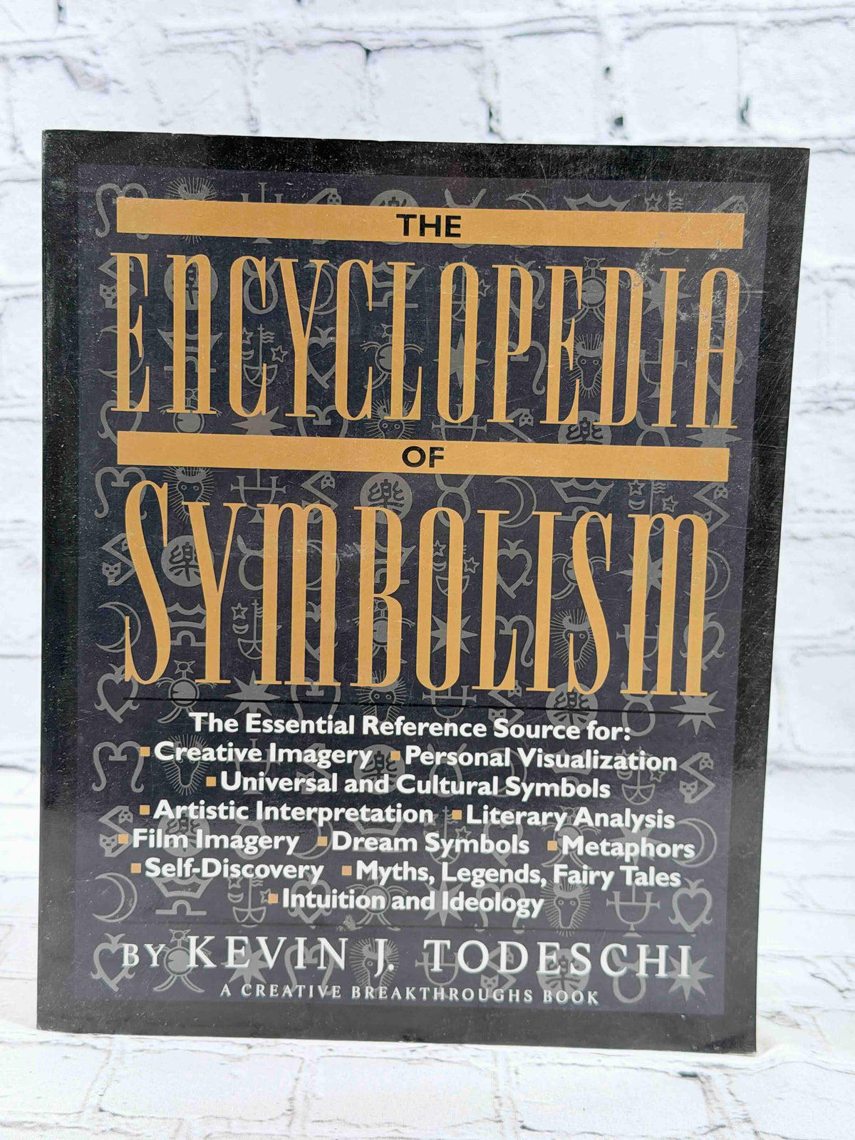The Encyclopedia of Symbolism by Kevin J. Todeschi, 1995 Perigee paperback - front cover