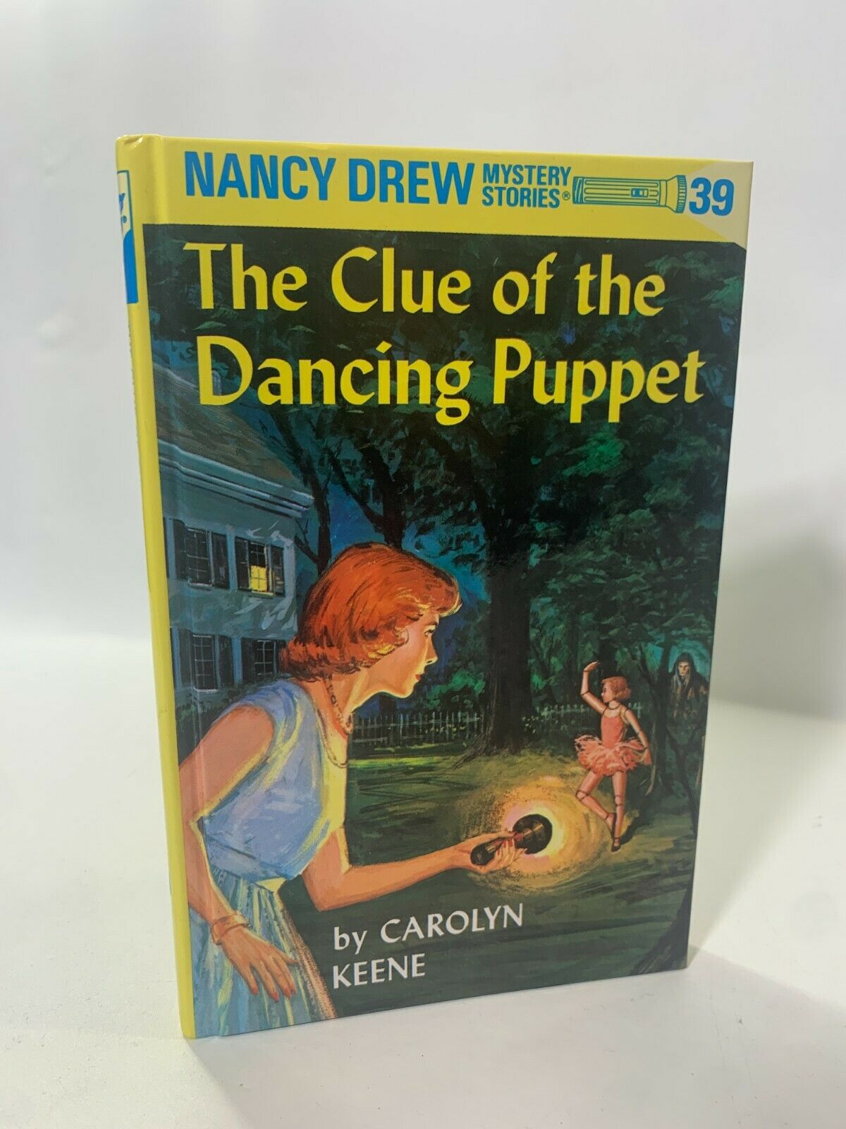 39. The Clue of the Dancing Puppet by Carolyn Keene [2000 · Nancy Drew]