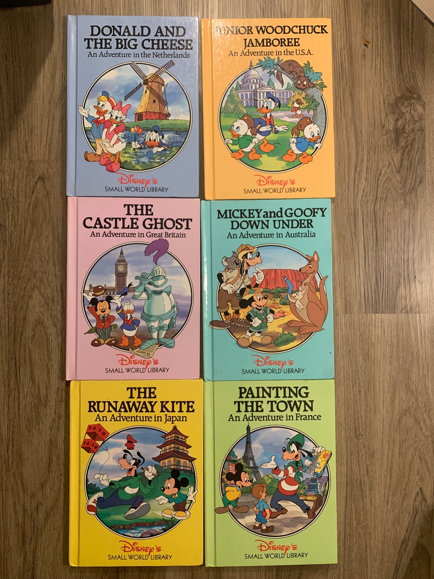 Lot of 6 Disney’s Small World Library Books Mickey Mouse Goofy Disney
