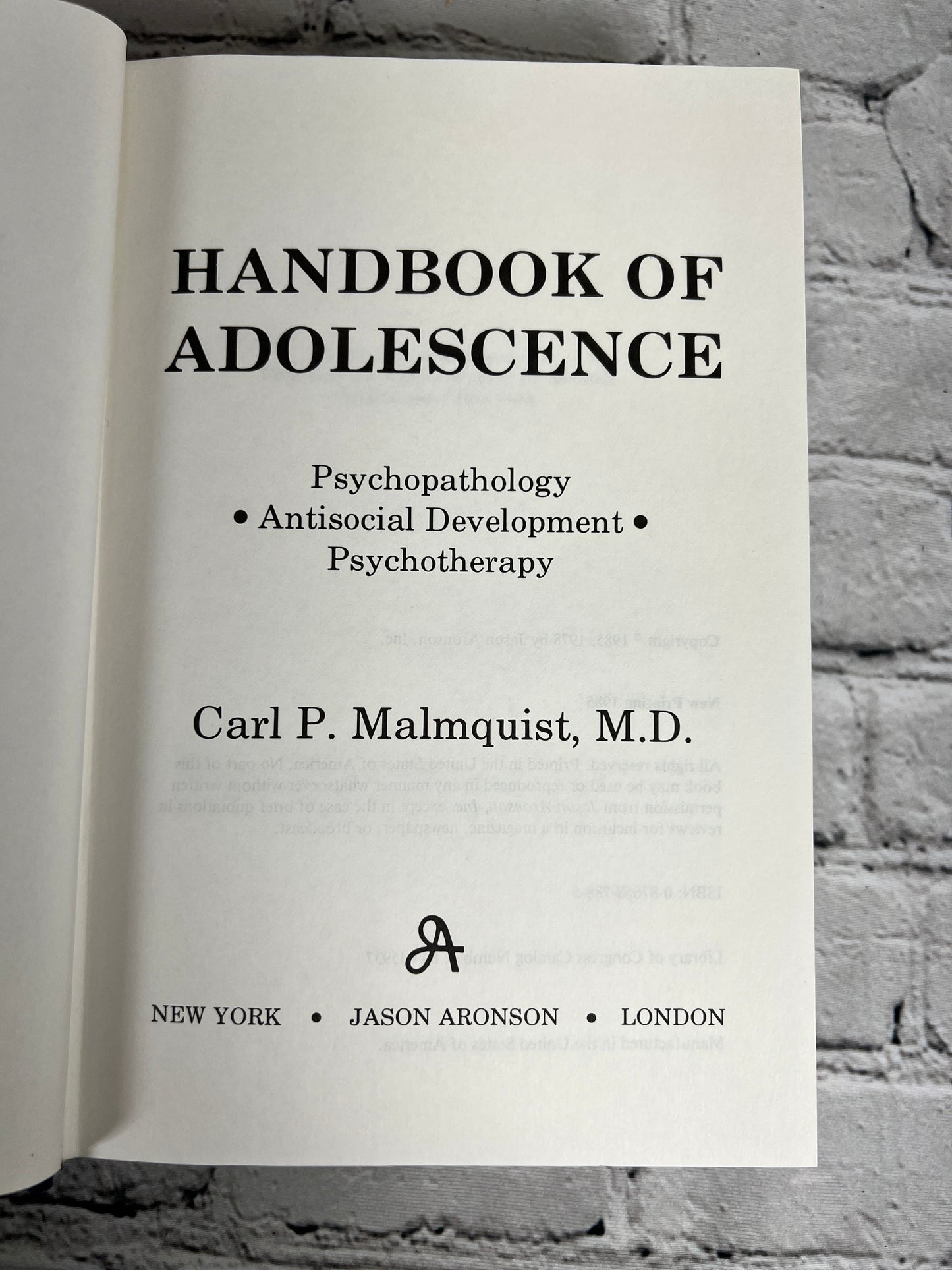 Handbook of Adolessence by Carl P. Malmquist [1985]