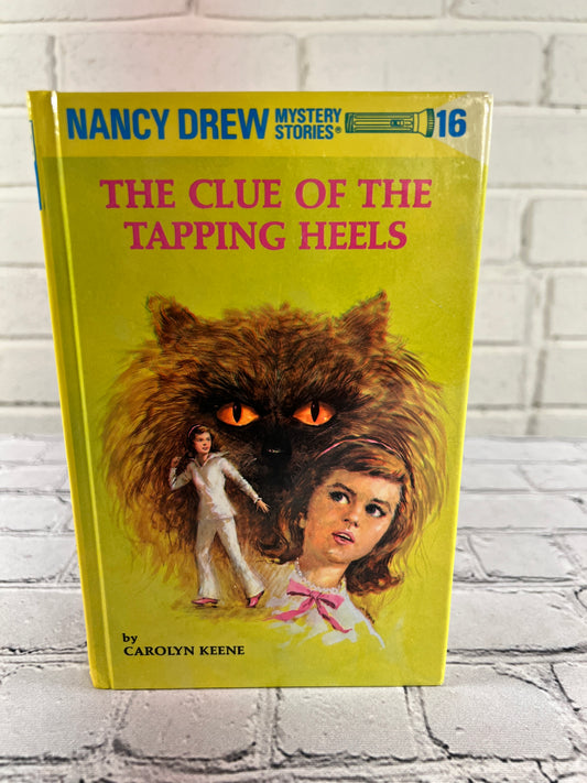16. The Clue of the Tapping Heels by Carolyn Keene [2000 · Nancy Drew]