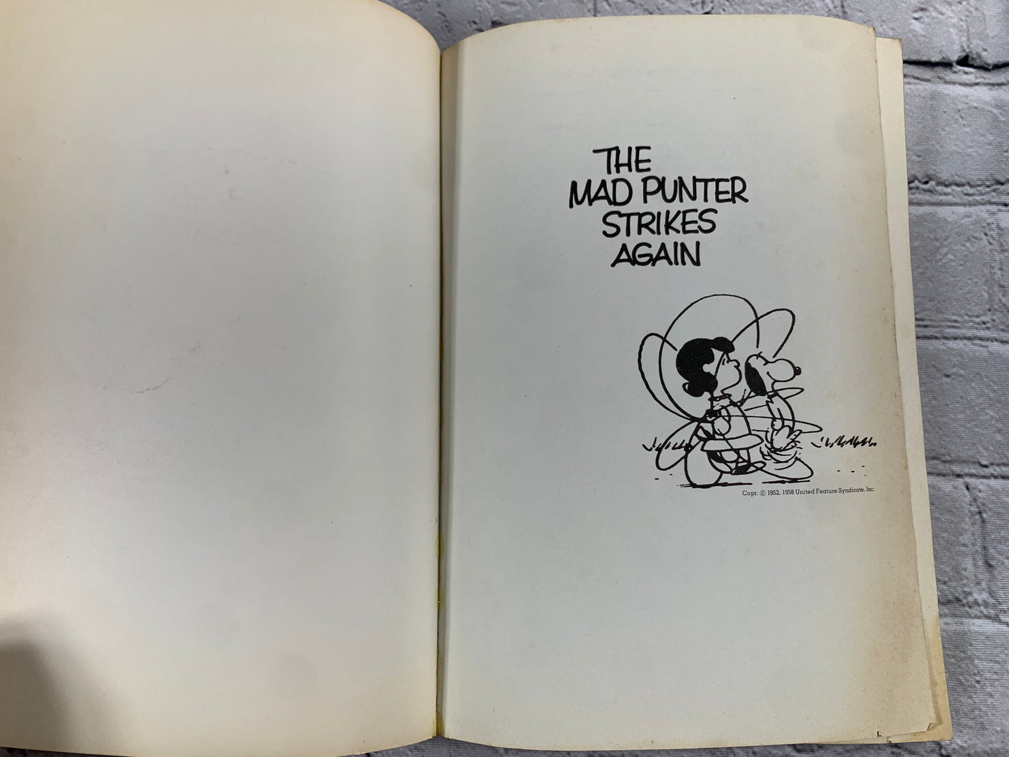 The Mad Punter Strikes Again by Charles Schulz [1976 · Peanuts Parade Book · #7]