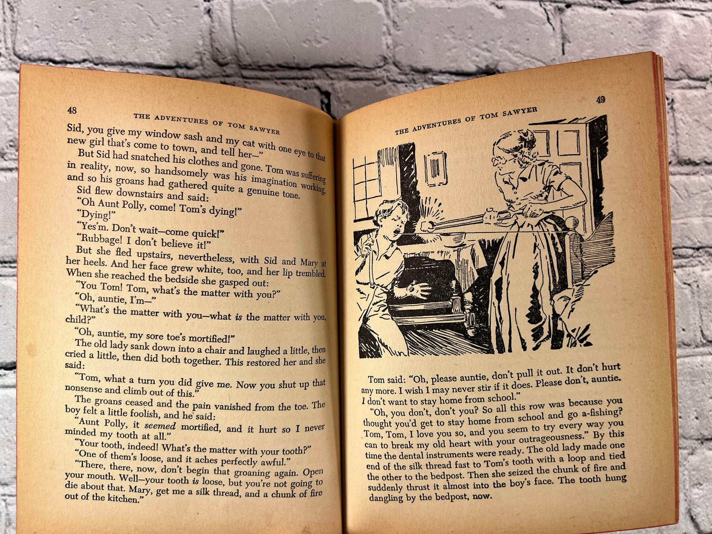 Flipped Pages Antiquarian & Collectible The Adventures of Tom Sawyer by Mark Twain [1944]